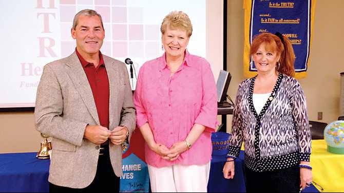 Rockdale-Rotary-Club-President-Elly-Dalton-and-treasurer-Anita-Smith-present-a-1500-donation-to-Dave-Buser-for-Rockdale-CARES