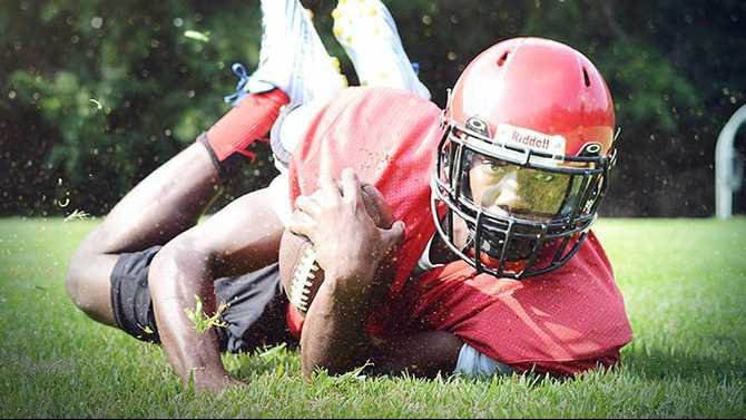 football-cover-2-grass-particles-flying