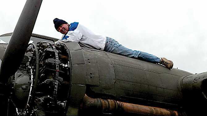 Nomad---Jim-Lawrence-working-on-WWII-B-17-engine