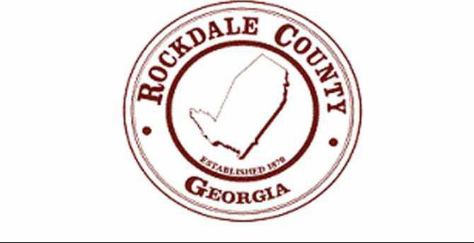 Rockdale County logo maroon pixelated 