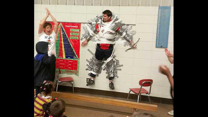 HCE-taped-Mr-Cheek-to-the-wall-fundraiser