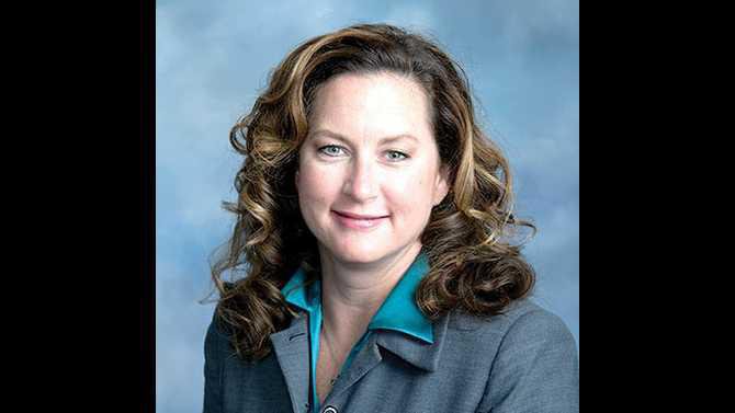 JaNice-Van-Ness-grey-suit-teal-shirt-updated-photo