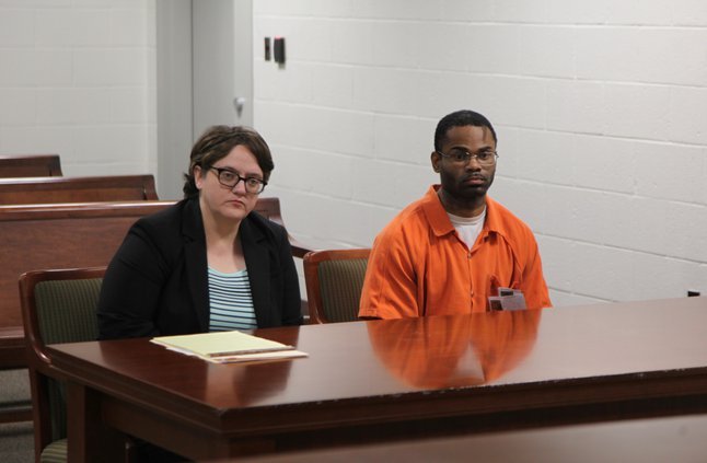 cook listens as bell explains.jpg