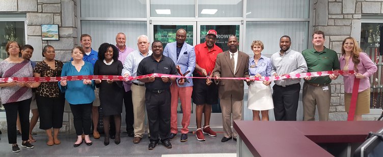 ribbon cutting smiling.jpg