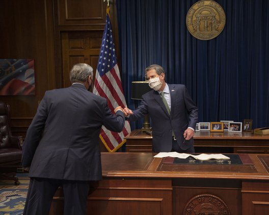 Gov. Kemp fist bumps
