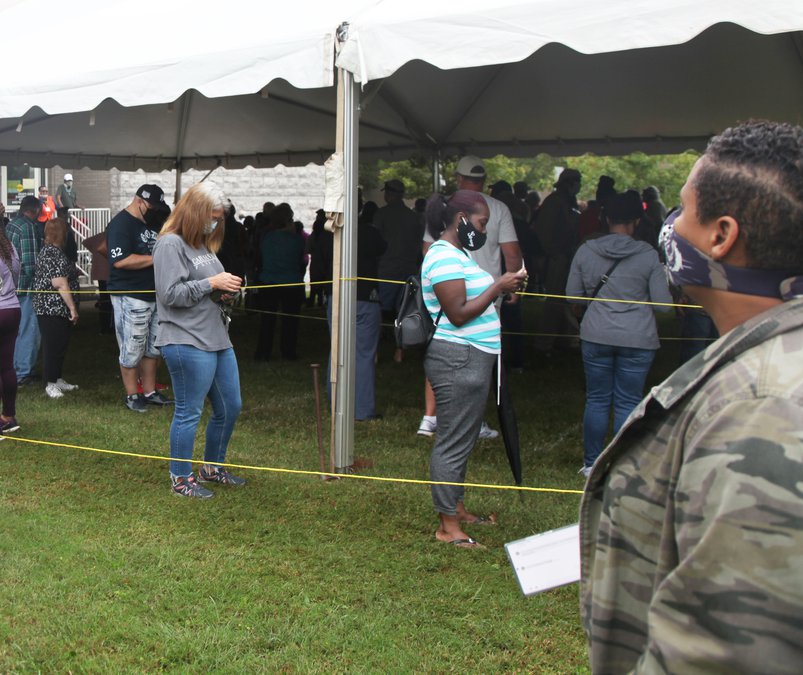 Newton elections office adjusts to surge in early voters The