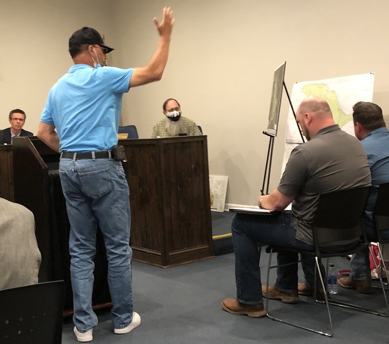 Porterdale council takes no vote but hearing shows divide on Oaks