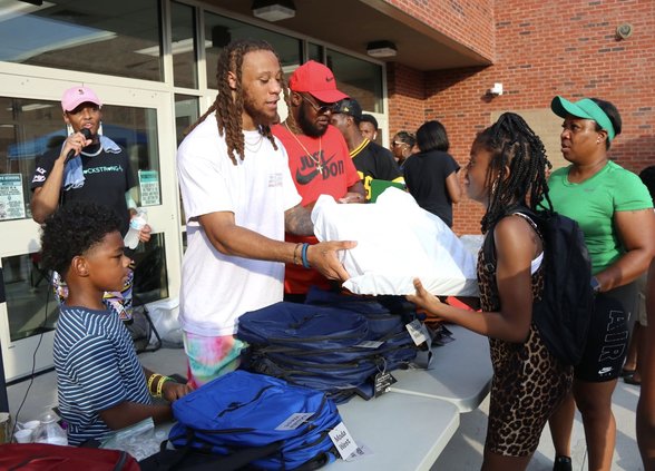 Eric Stokes book bag drive