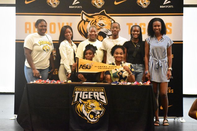 Destini Lewis signing
