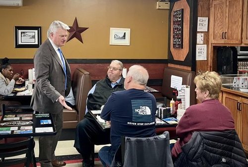 mike collins pot luck cafe