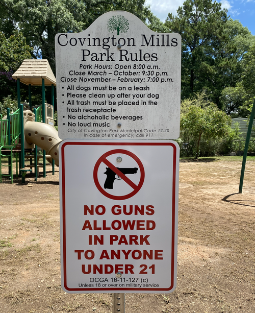 guns in parks signs