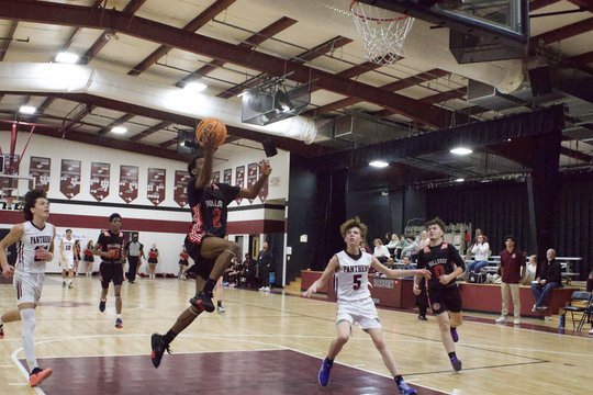 Covington Academy secures 60-55 victory over Peachtree Academy