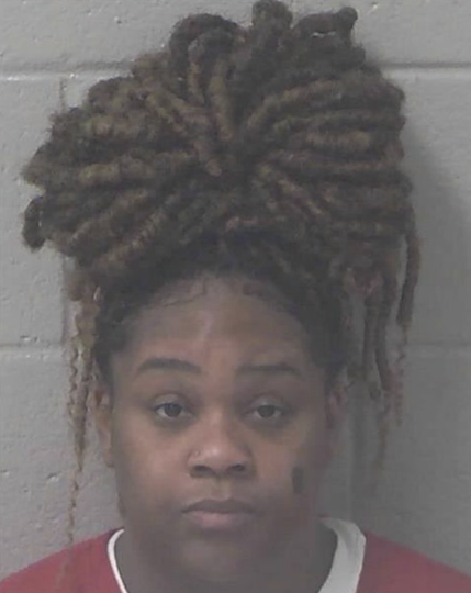 Woman charged in crash that injured two paramedics