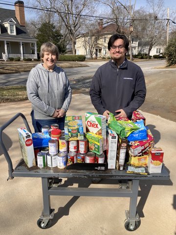 The News makes food drive donation