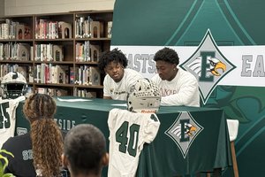 Seymore, McMichael Signings