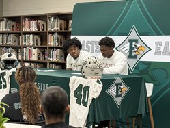 Seymore, McMichael Signings
